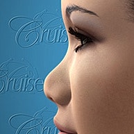 Profile view of a woman against blue background.