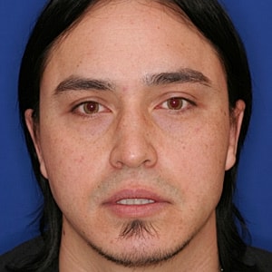 Male with long black hair and light complexion.