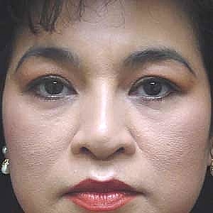 Close-up portrait of a woman with makeup.
