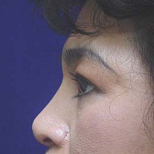 Close-up portrait of a woman with makeup.