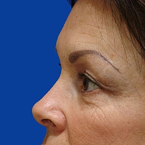 Close-up portrait of a woman with makeup.