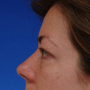 Close-up portrait of a woman with makeup.