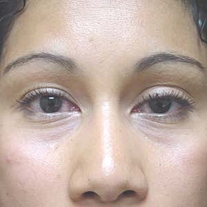 Close-up portrait of a woman with makeup.