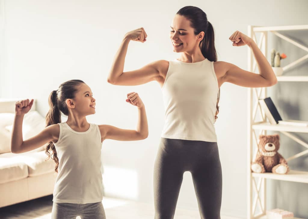 fit woman with daughter