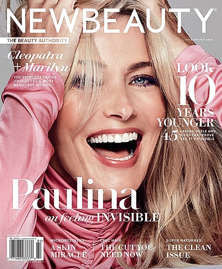 Cover of New Beauty magazine featuring smiling woman.